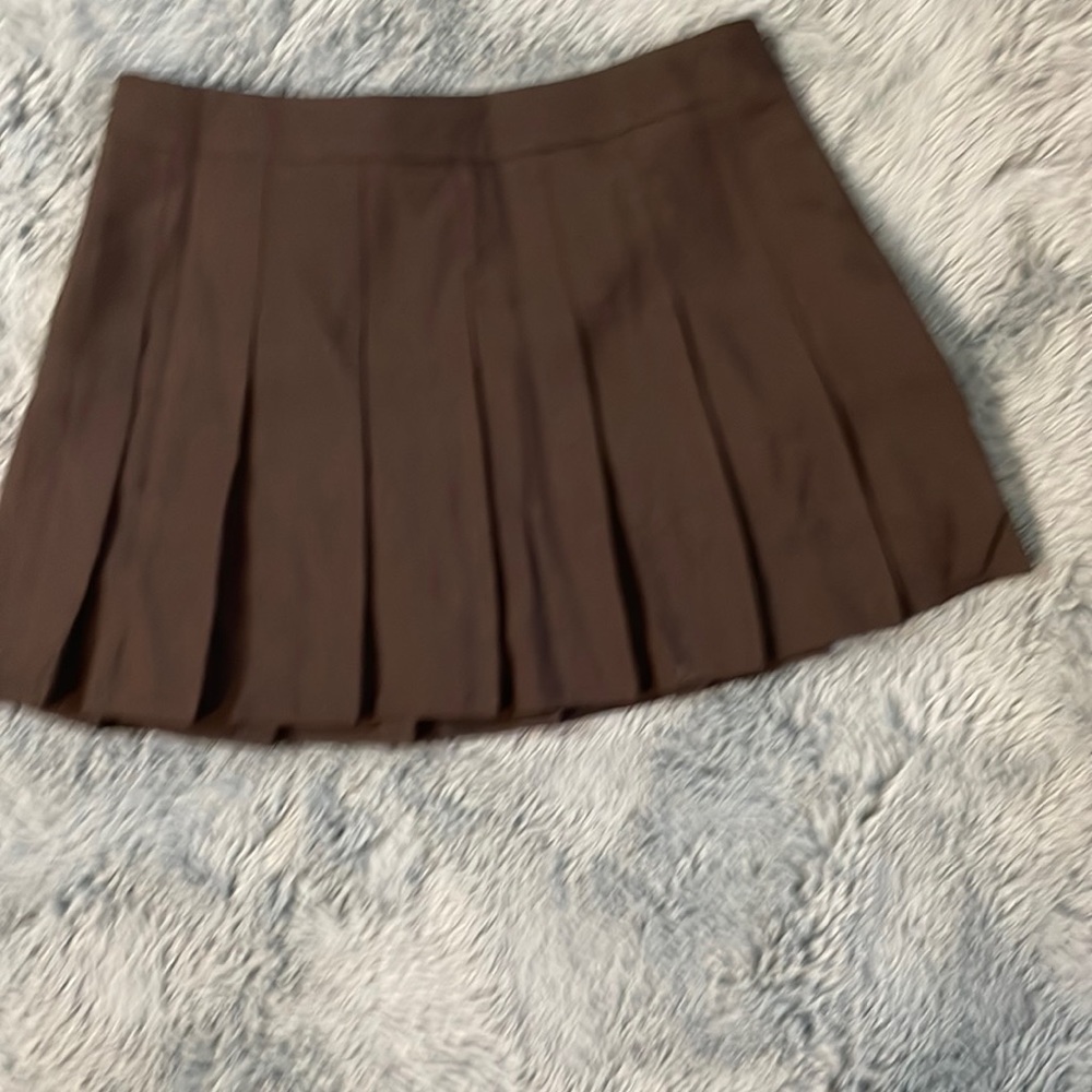 Pleated black skirt NWOT shorts on inside